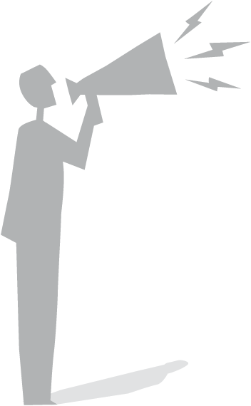 Ein Mann spricht in ein Megafon.